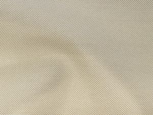 Nahaufnahme von einem Outdoorstoff mit gewebtem Muster in beige