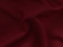 Nahaufnahme von hochwertigem Jersey Tencel Stoff in Bordeaux – einfarbig, glatt und weich, ideal für T-Shirts, Tops, Kleider und Leggings. Atmungsaktiv und angenehm auf der Haut für bequeme Alltagsmode