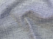 Nahaufnahme von Webware Leinen leicht dehnbar - meliert - blau