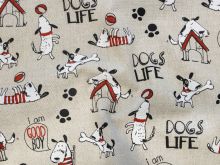 Nahaufnahme von einem Half Panama Dekostoff mit Hundemotiven in beige