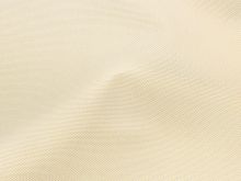 Nahaufnahme von einem Outdoorstoff mit gewebtem Muster in der Farbe creme